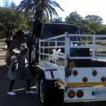 Gone to Egoli Report Cover Photo: Zimbabweans in Bulawayo board the “Omalayitsha” to Johannesburg, June 2009