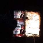 Punish Dissent, Silence Citizens Report Cover Photo: In a brave act of defiance, posters of Morgan Tsvangirai hang on the wall of a hut burnt by ZANU PF supporters in Shamva, April 2008