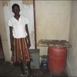 A pregnant woman stands in her empty kitchen, rural Gwanda, October 2011. A pregnant woman stands in her empty kitchen, rural Gwanda, October 2011.