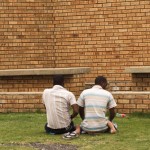 Relatives pray outside after visiting detainees inside Lindela Detention Centre, Krugersdorp, South Africa Relatives pray outside after visiting detainees inside Lindela Detention Centre, Krugersdorp, South Africa